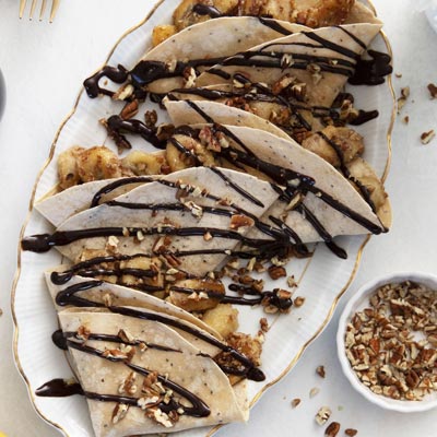 Dessert wrap drizzled with chocolate sauce