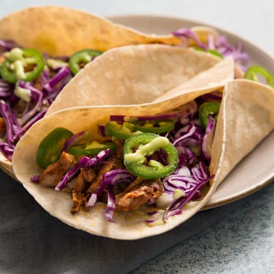 Chile-lime chicken wrap showing shredded spicy chicken