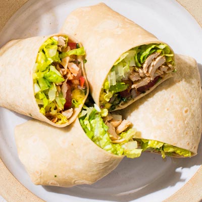 Hawaiian chicken wrap showing grilled chicken