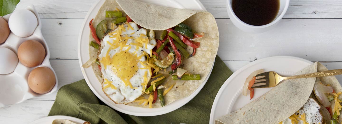 Roasted vegetable and egg breakfast wrap